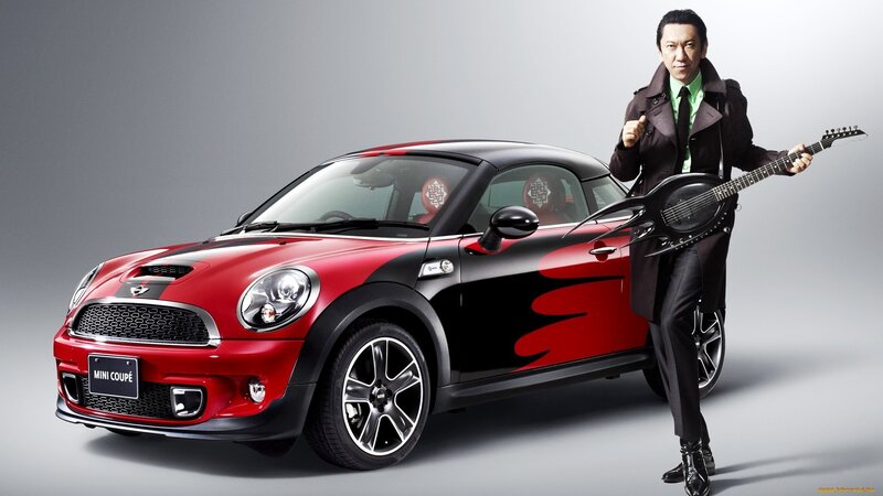 Man with Guitar and Car