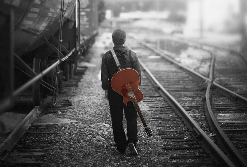 Man with Guitar — Black, Melancholic