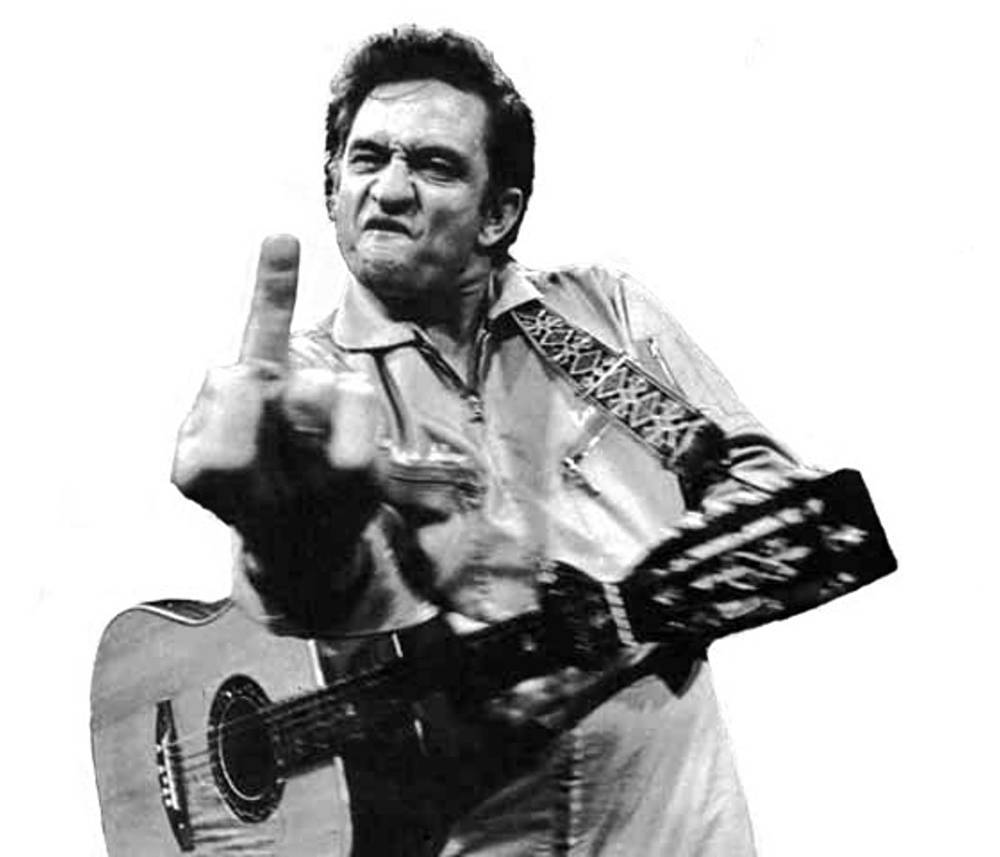 Man with guitar making a gesture