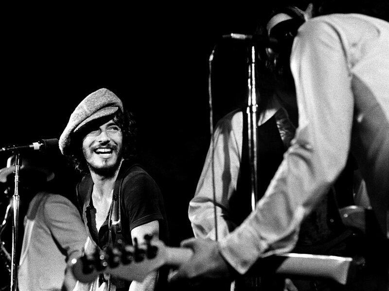 Man with Guitar on Stage — Black