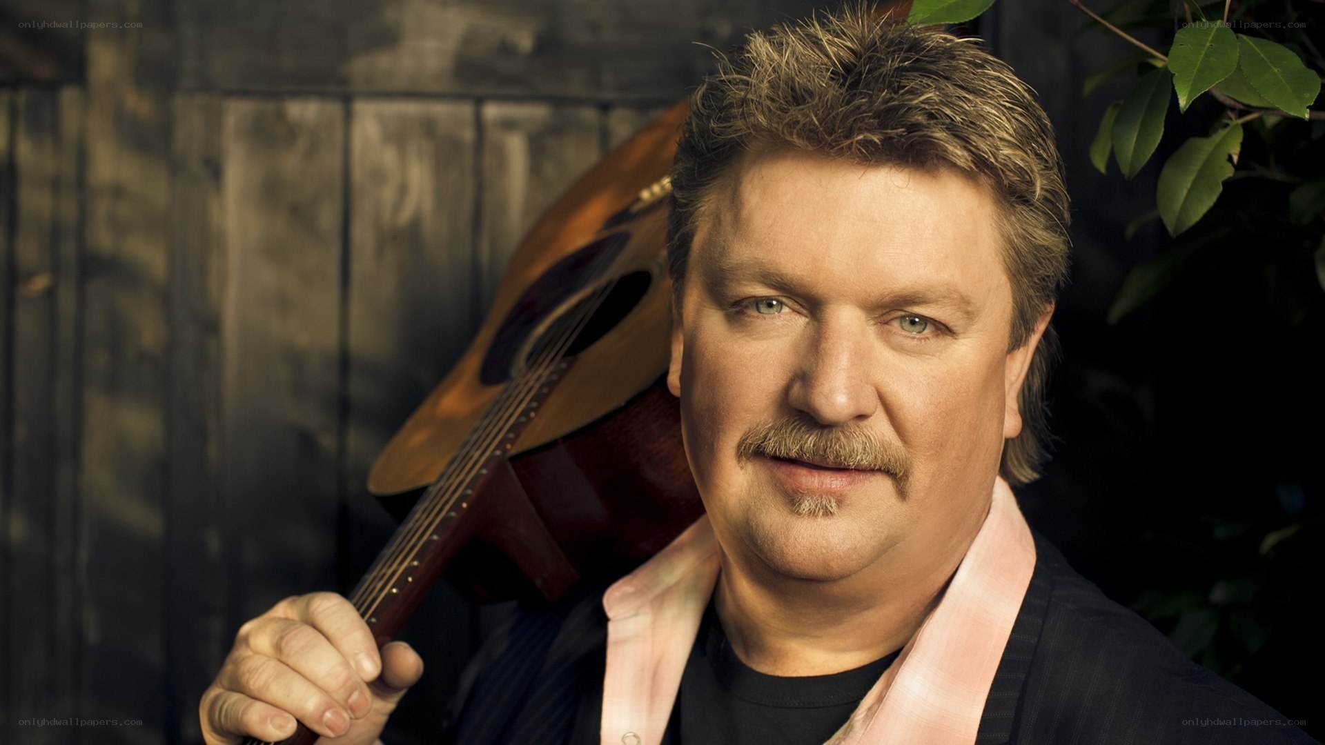 man with guitar portrait