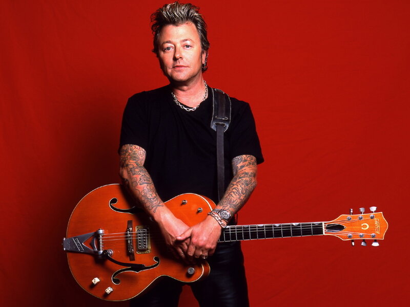 Man with Guitar — Red, Confident