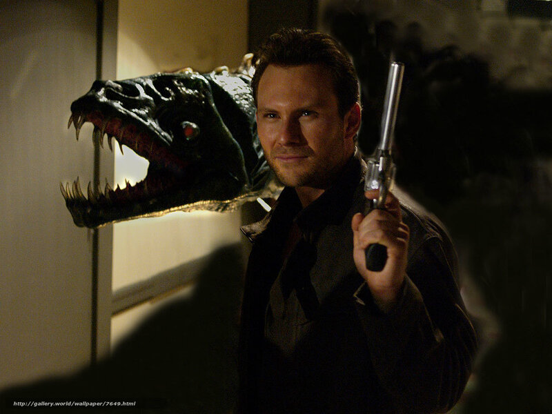 Man with gun and monster head