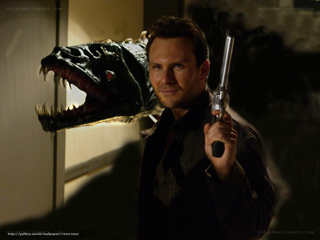 Man with gun and monster head