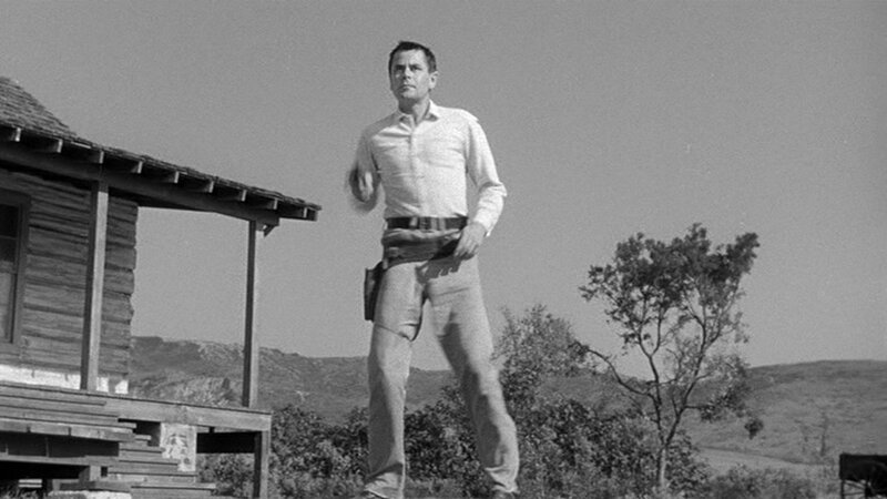 Man with gun in western scene