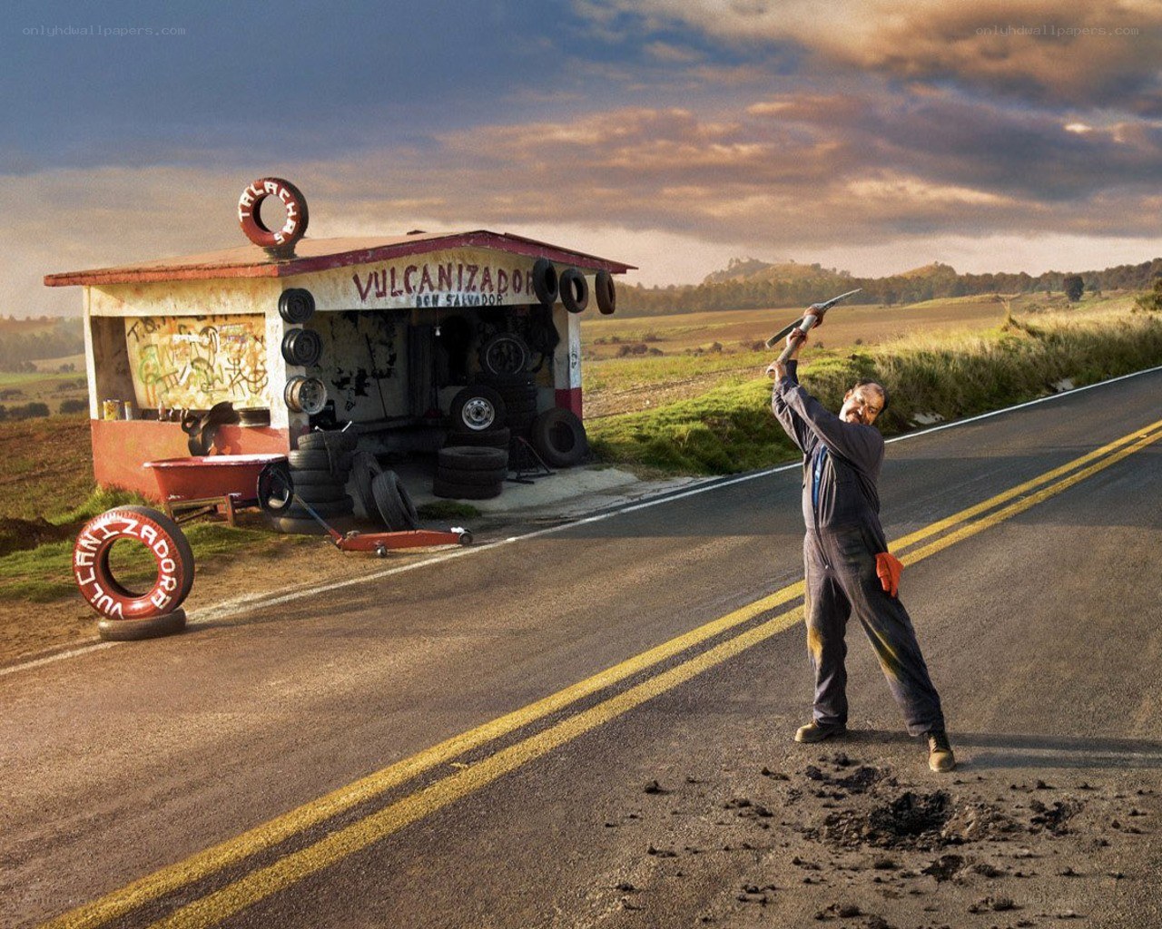 Man with hammer on roadside