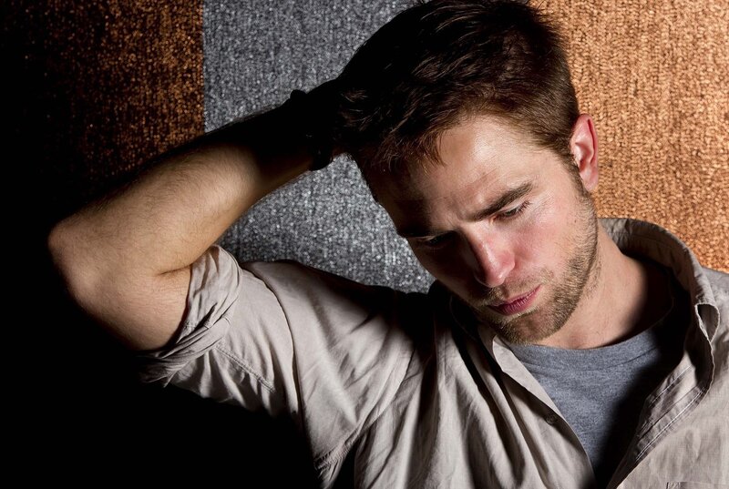 Man with Hand in Hair — Brown