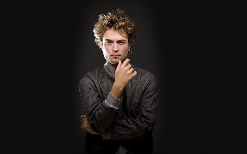 man with hand on chin