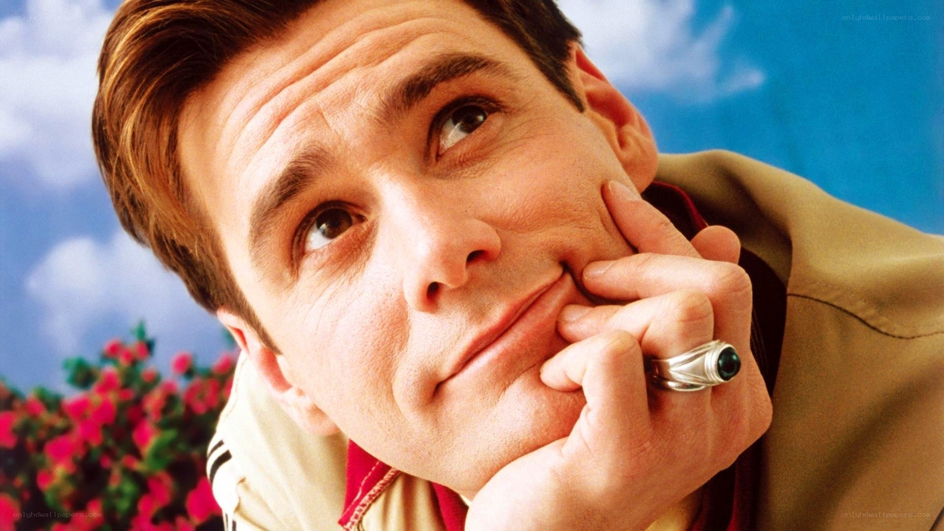man with hand on chin