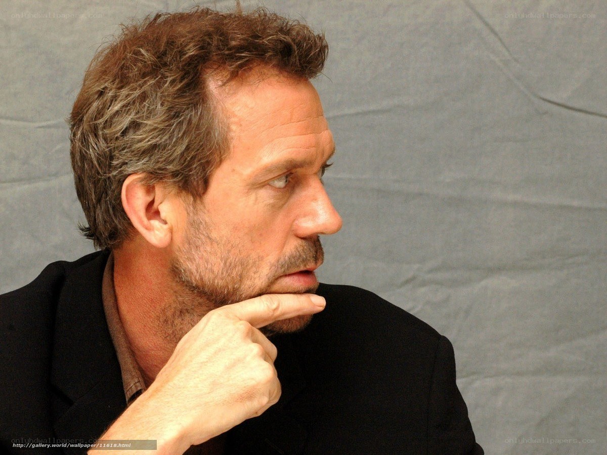 man with hand on chin
