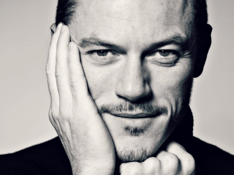 Man with Hand on Face — Black, Serious, Photograph, Mustache