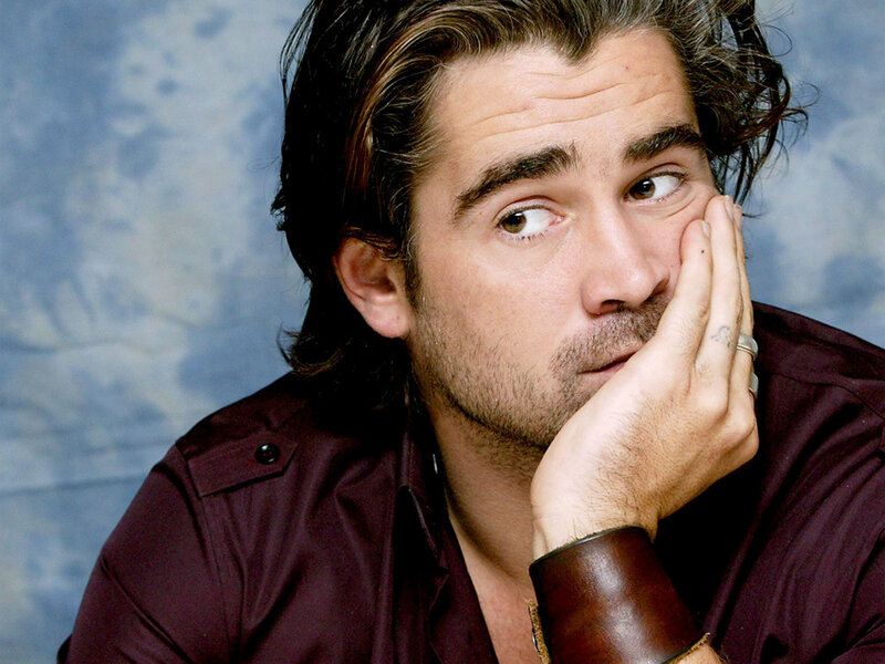 Man with Hand on Face — Maroon, Contemplative
