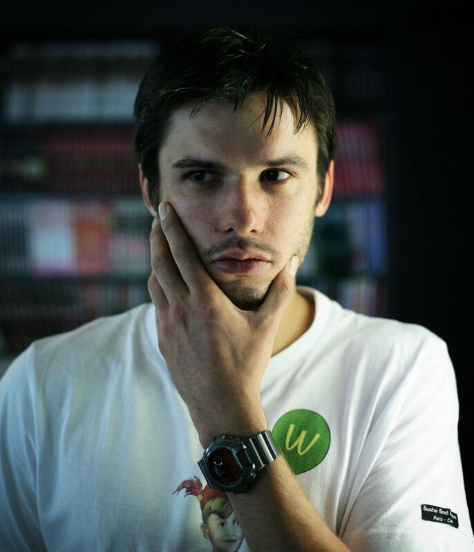 Man with Hand on Face — White, Serious