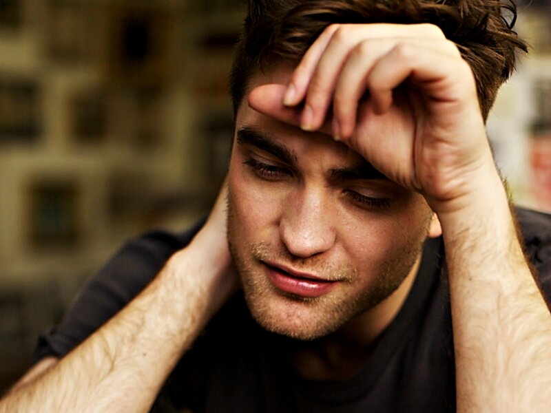 Man with Hand on Forehead — Brown, Contemplative