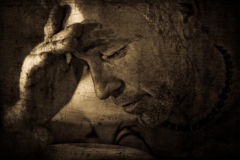 Man with Hand on Forehead — Brown