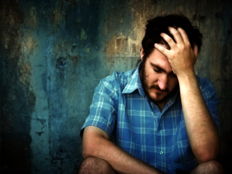 Man with Hand on Head — Blue