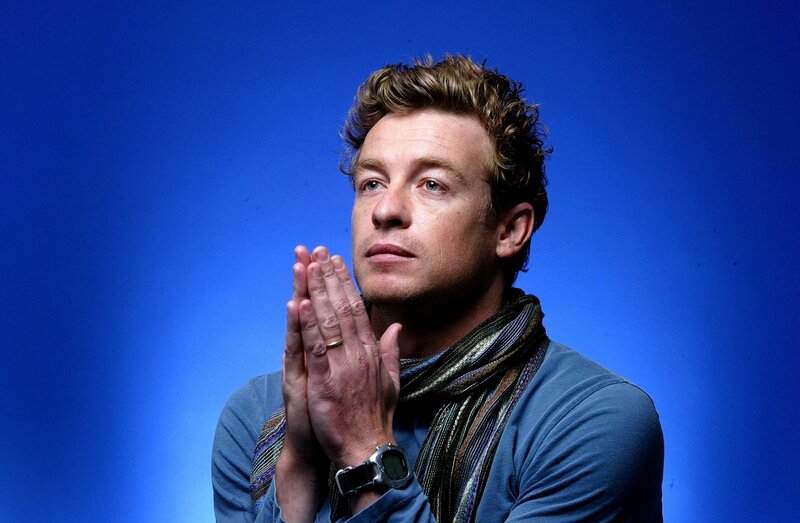 man with hands clasped