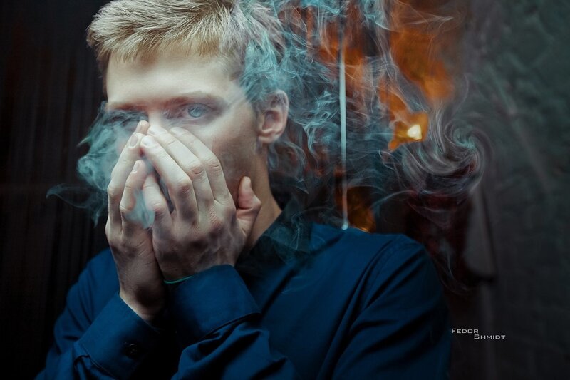 Man with Hands over Face — Blue