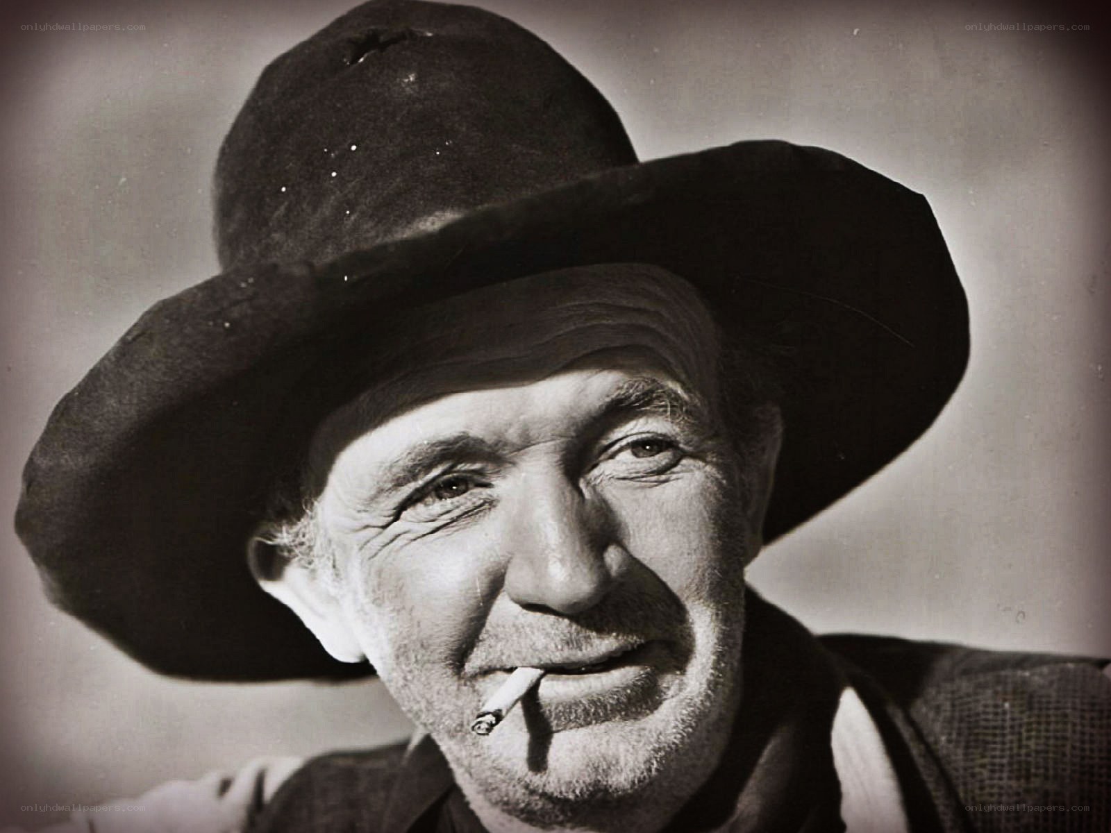 man with hat and cigarette