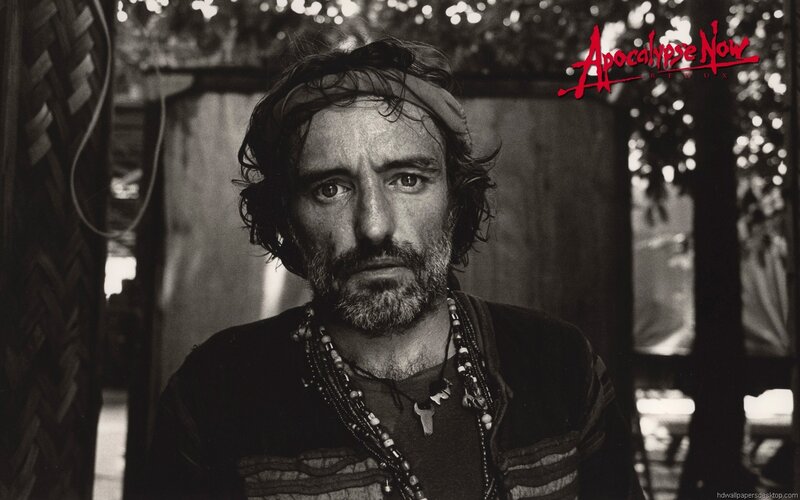 Man with Headband and Beaded Necklaces