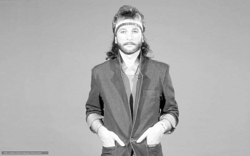 man with headband and jacket