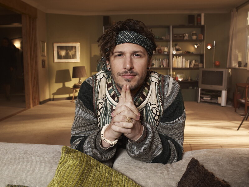 Man with Headband on Couch