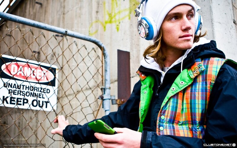 man with headphones and phone