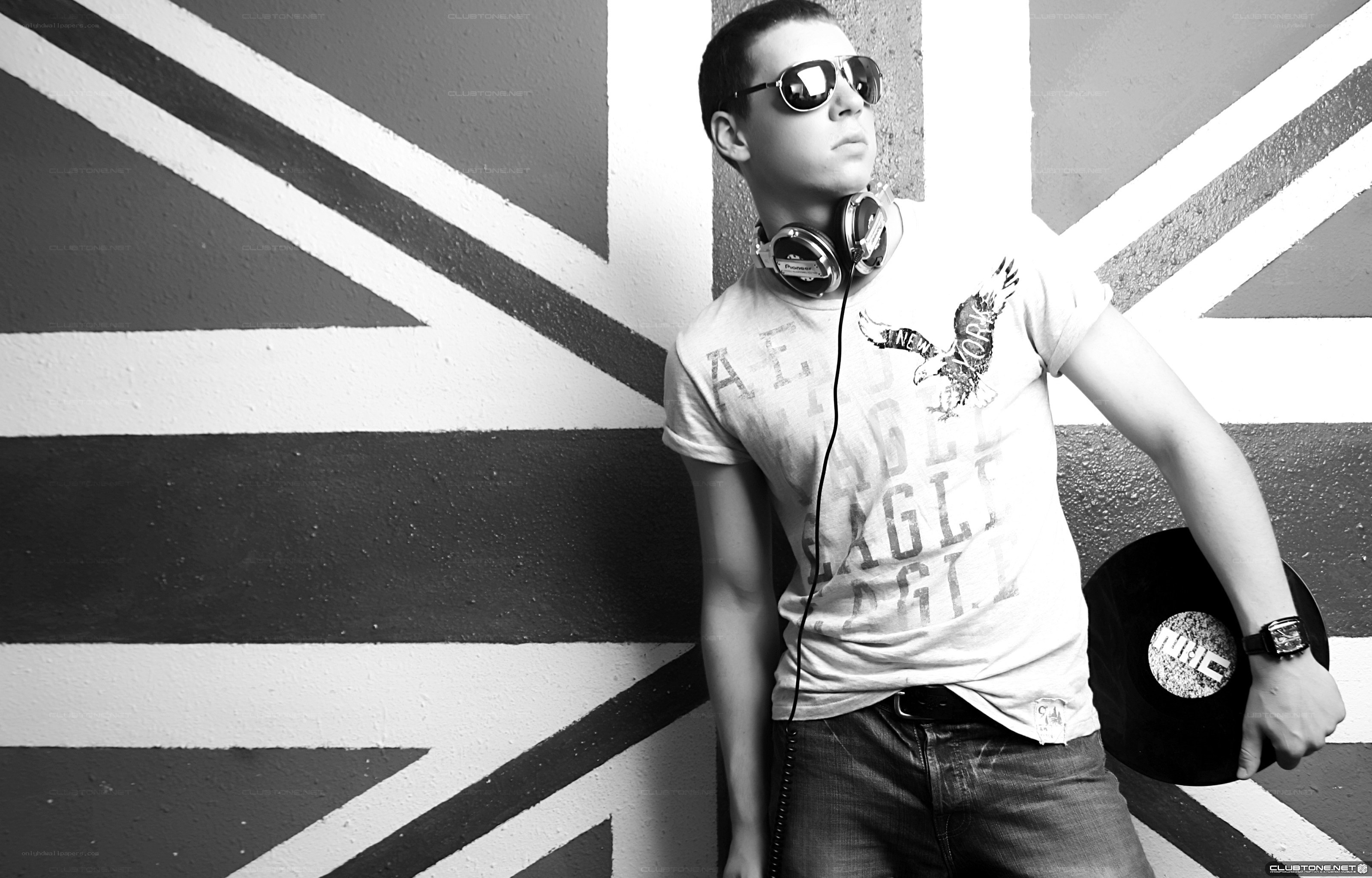 Man with headphones and vinyl record