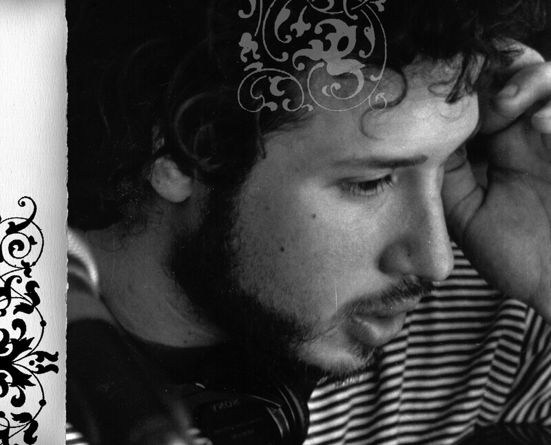 man with headphones in profile