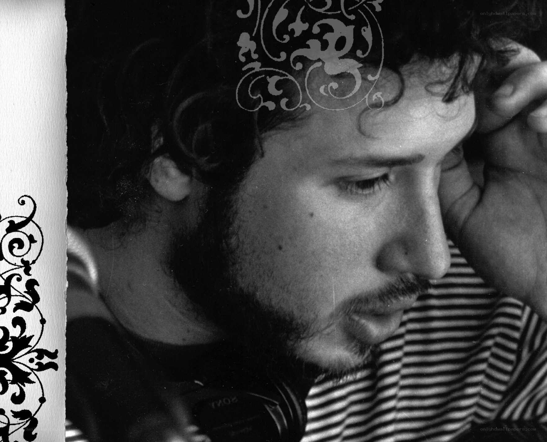 man with headphones in profile