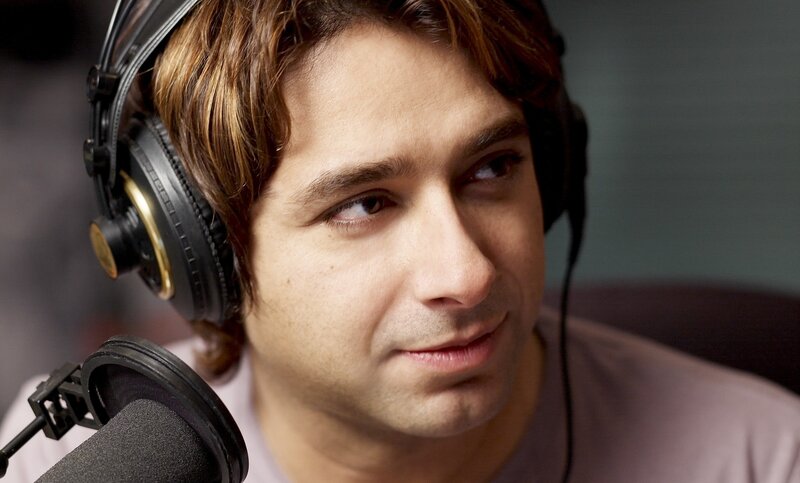 man with headphones in studio