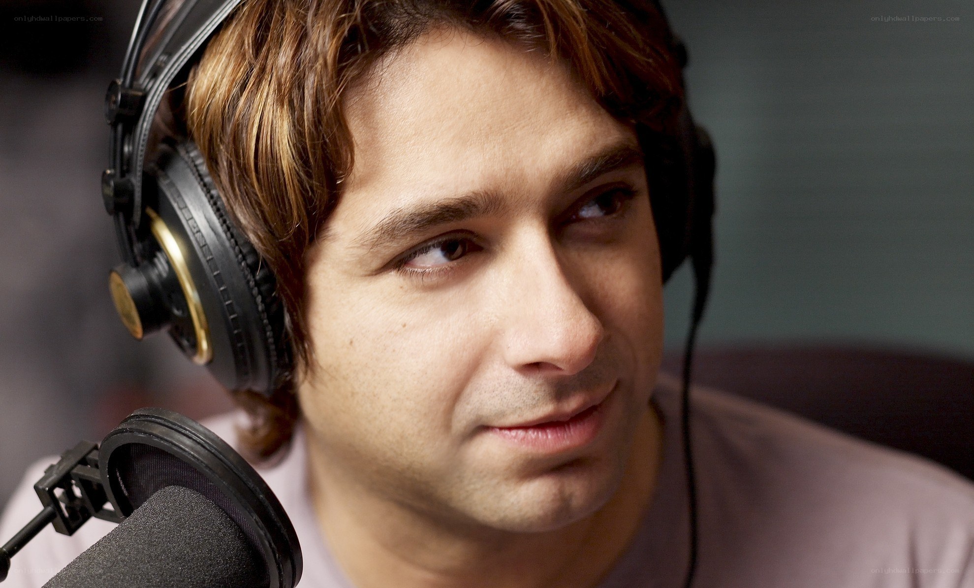 man with headphones in studio