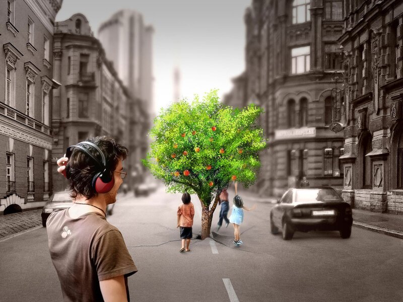 Man with headphones on city street