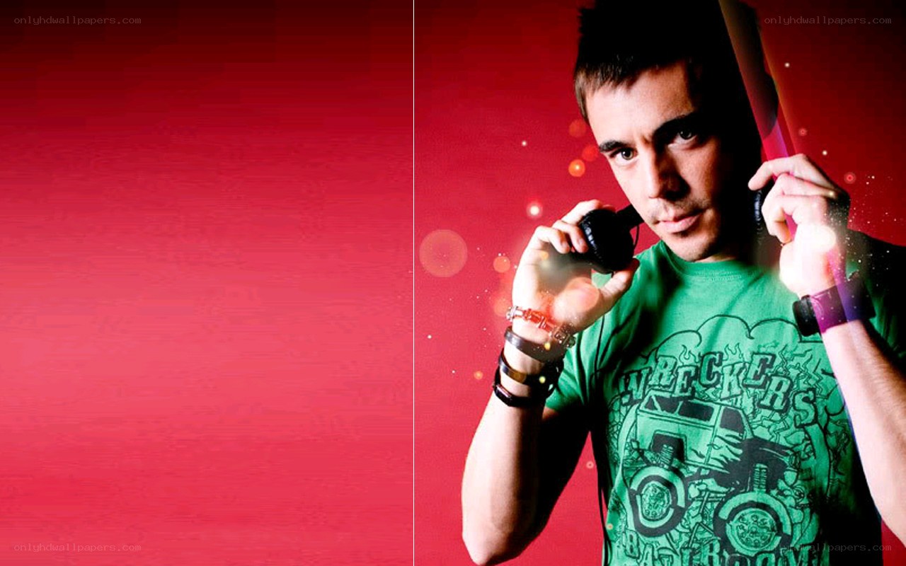 man with headphones on red background