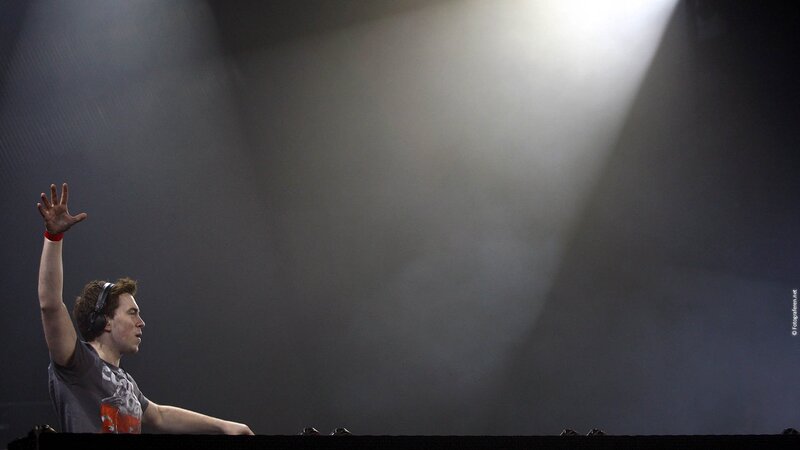 Man with Headphones on Stage