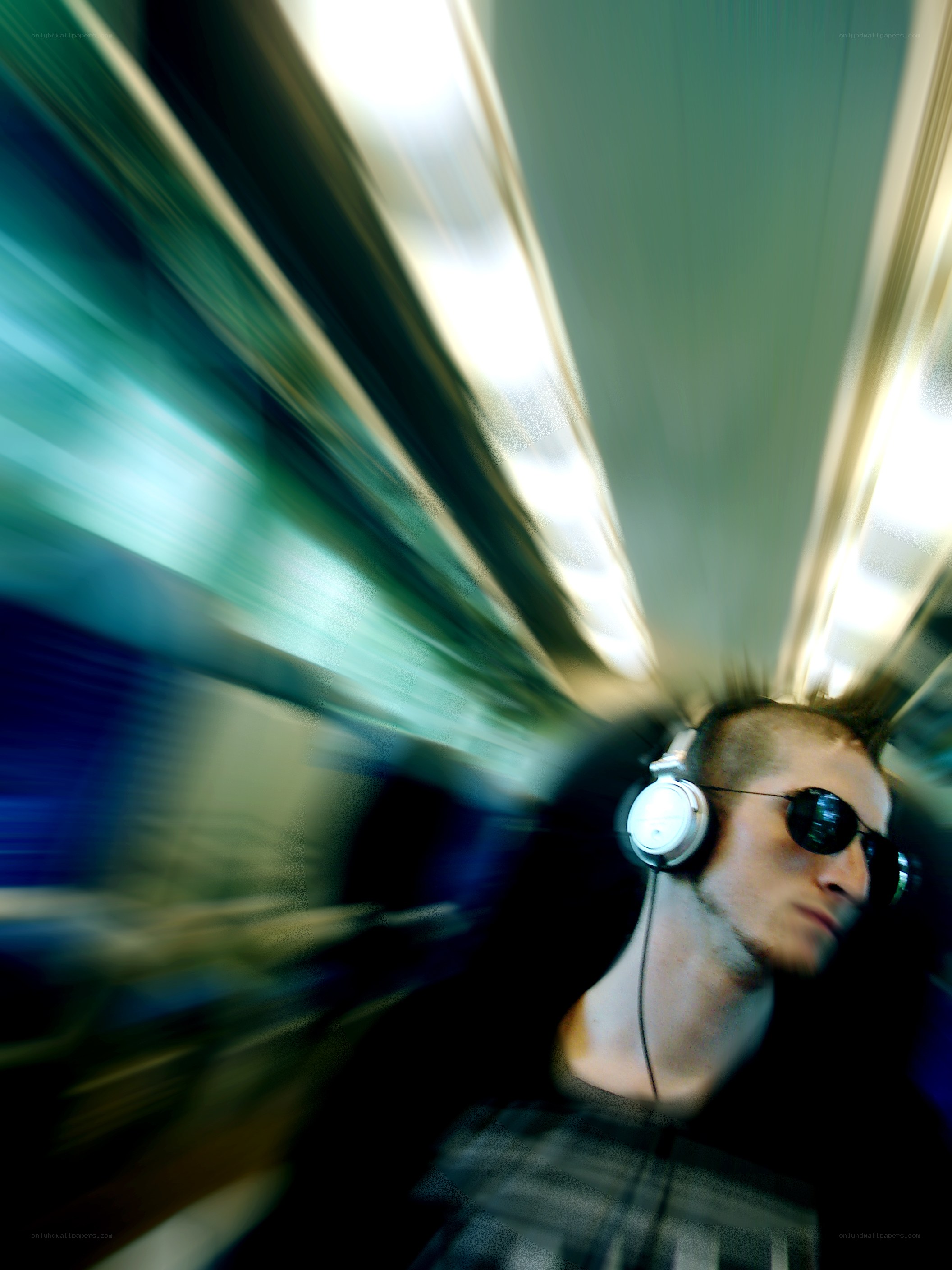 Man with headphones on train