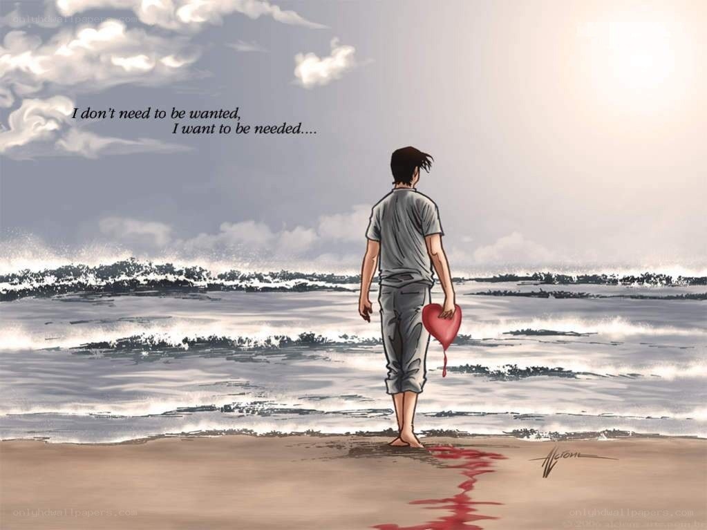 Man with heart on beach