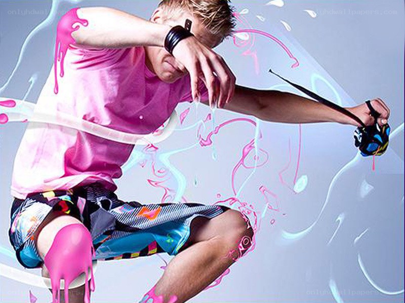 man with hula hoop and paint