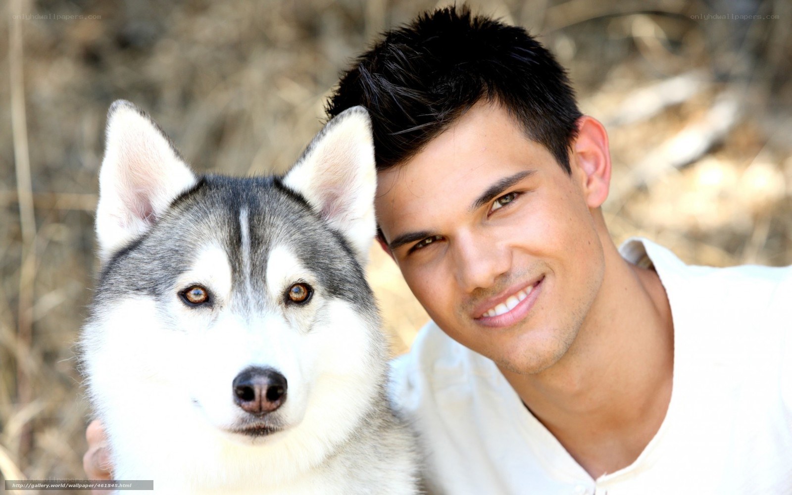 man with husky dog