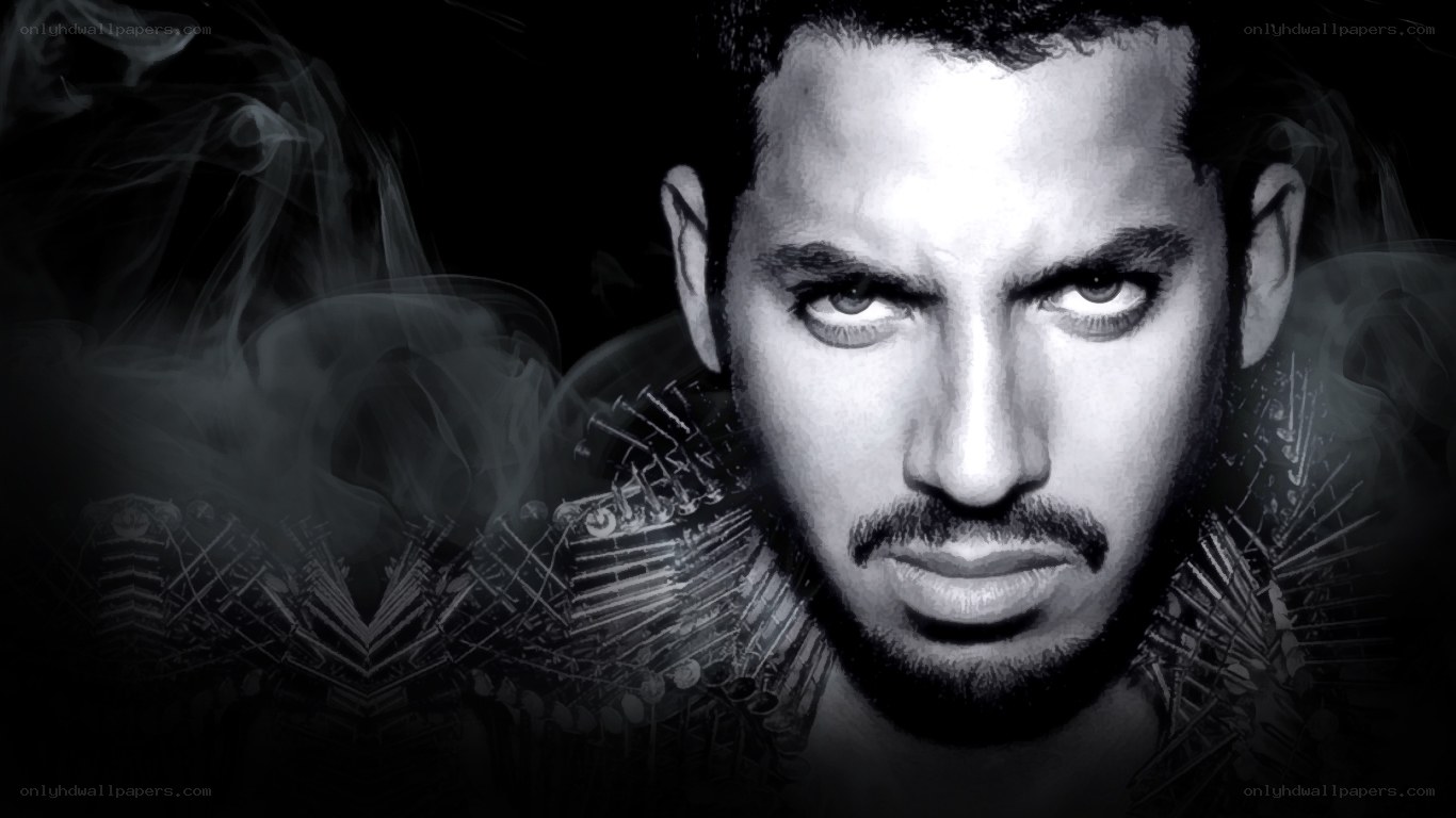 man with intense gaze and smoke