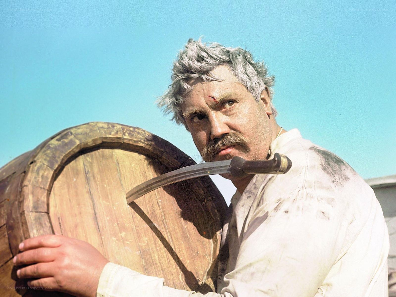 Man with knife and barrel