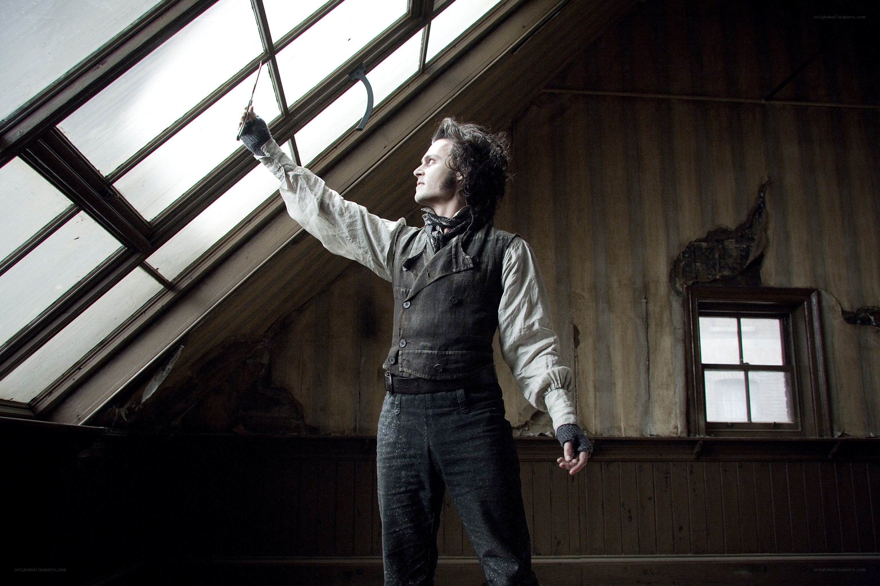 man with knife in attic