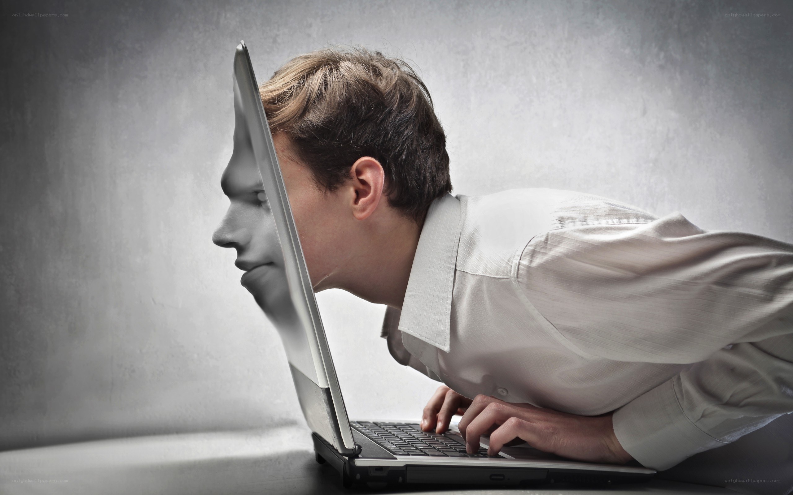 man with laptop face