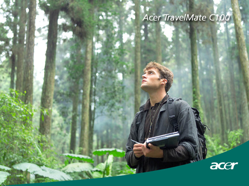 Man with laptop in forest