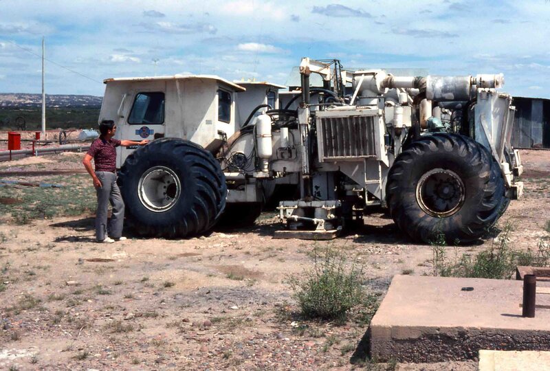 Man with large construction vehicle