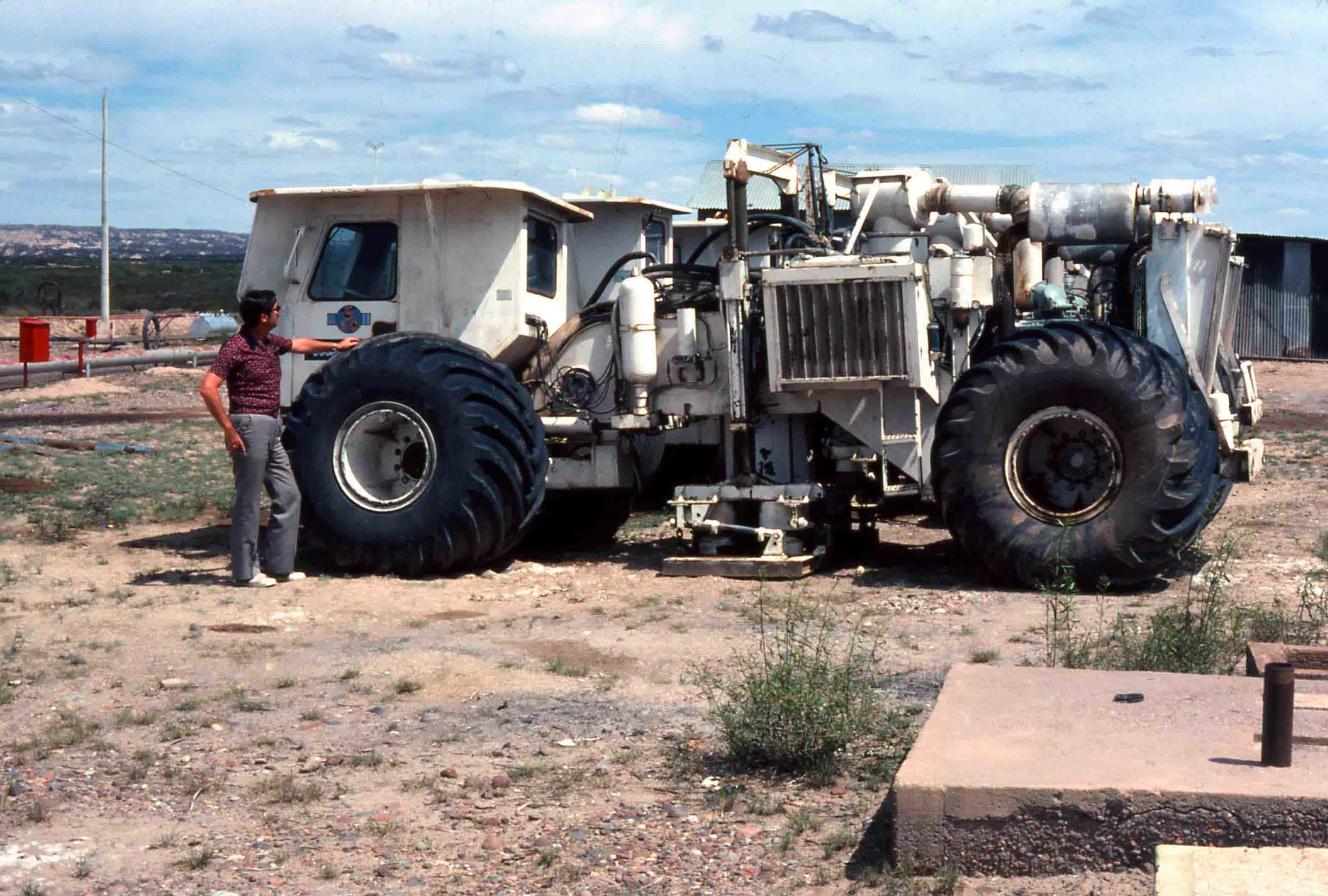 Man with large construction vehicle
