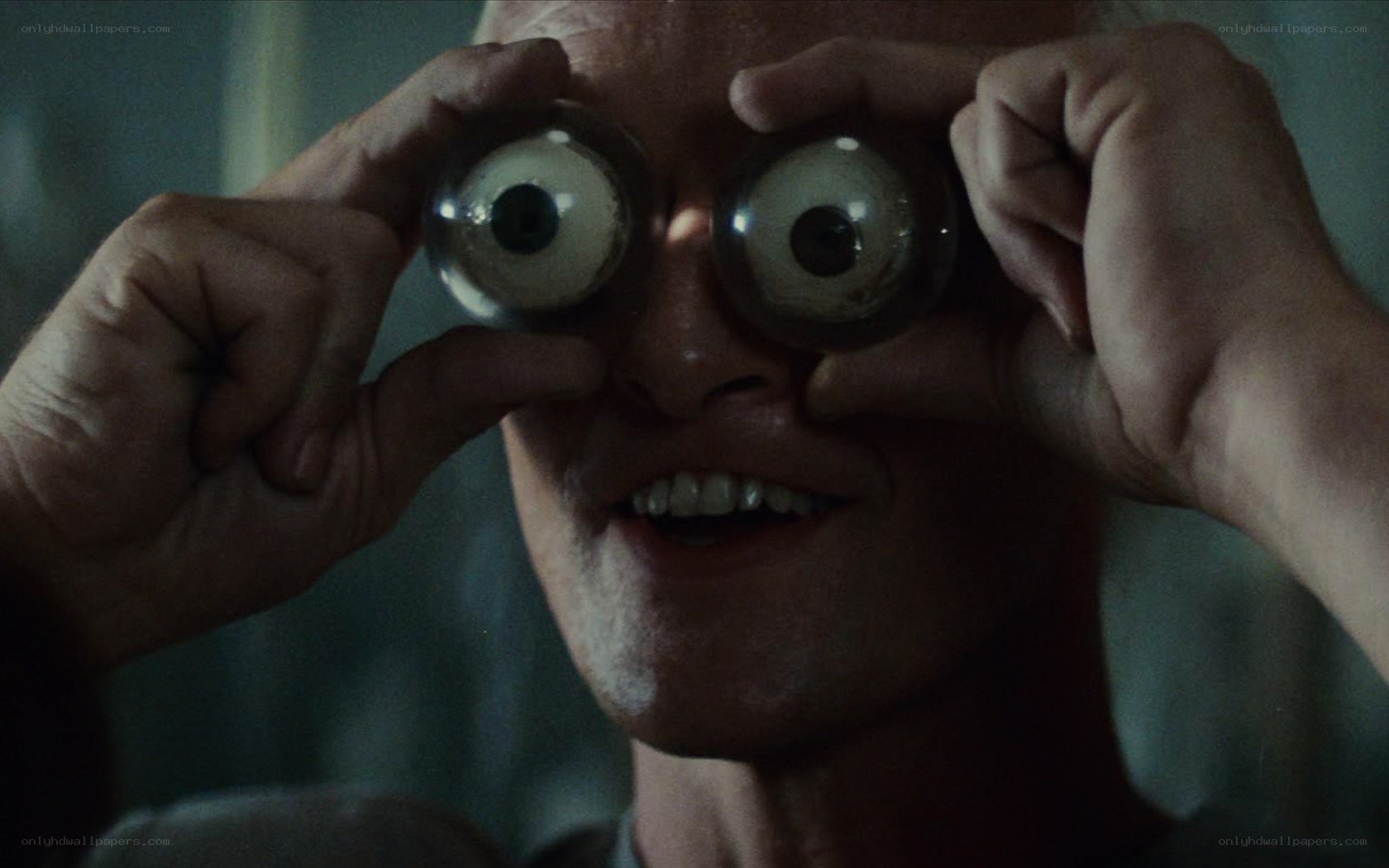 man with large eyes prop