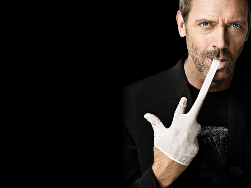 man with latex glove in mouth