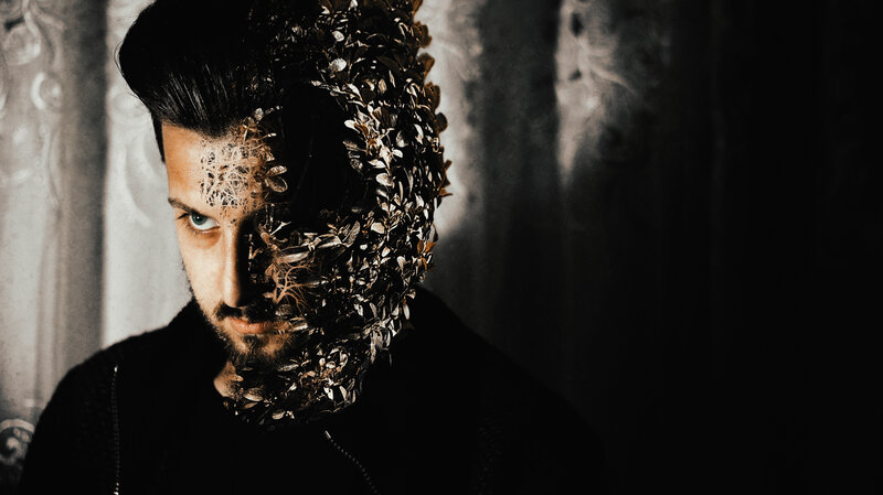Man with Leafy Mask