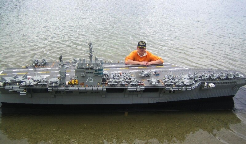 Man with Lego aircraft carrier